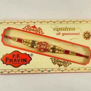 Rakhi with red Talisman 1stk.